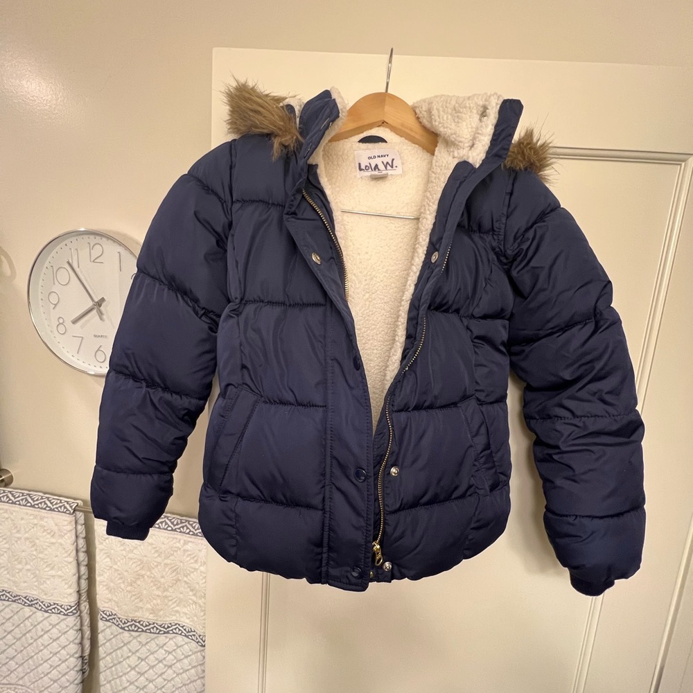 Old navy puffer jacket with fleece lining on body and hood. Size large girls.